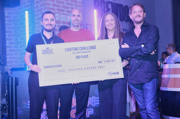Curtis Seed, Brand Manager receiving the prize on behalf of Martijn Van Summeren, who won 3rd Place ; Alex Kemanes, Regional Managing Director, NMK Electronics; Caro Chauvet, Director of Global Marketing at Chauvet Professional and Aaron Russ, Managing Director, ARLD