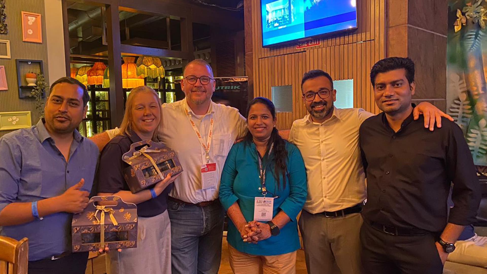 Team COMCON celebrating their new partnership with representatives from Meinberg