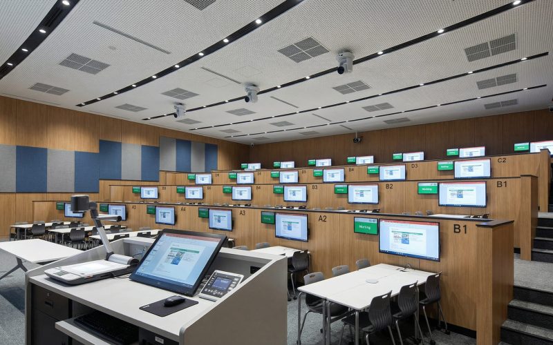 High-tech ceiling microphone array installed in a hybrid classroom to provide clear audio for both in-person students and remote participants.