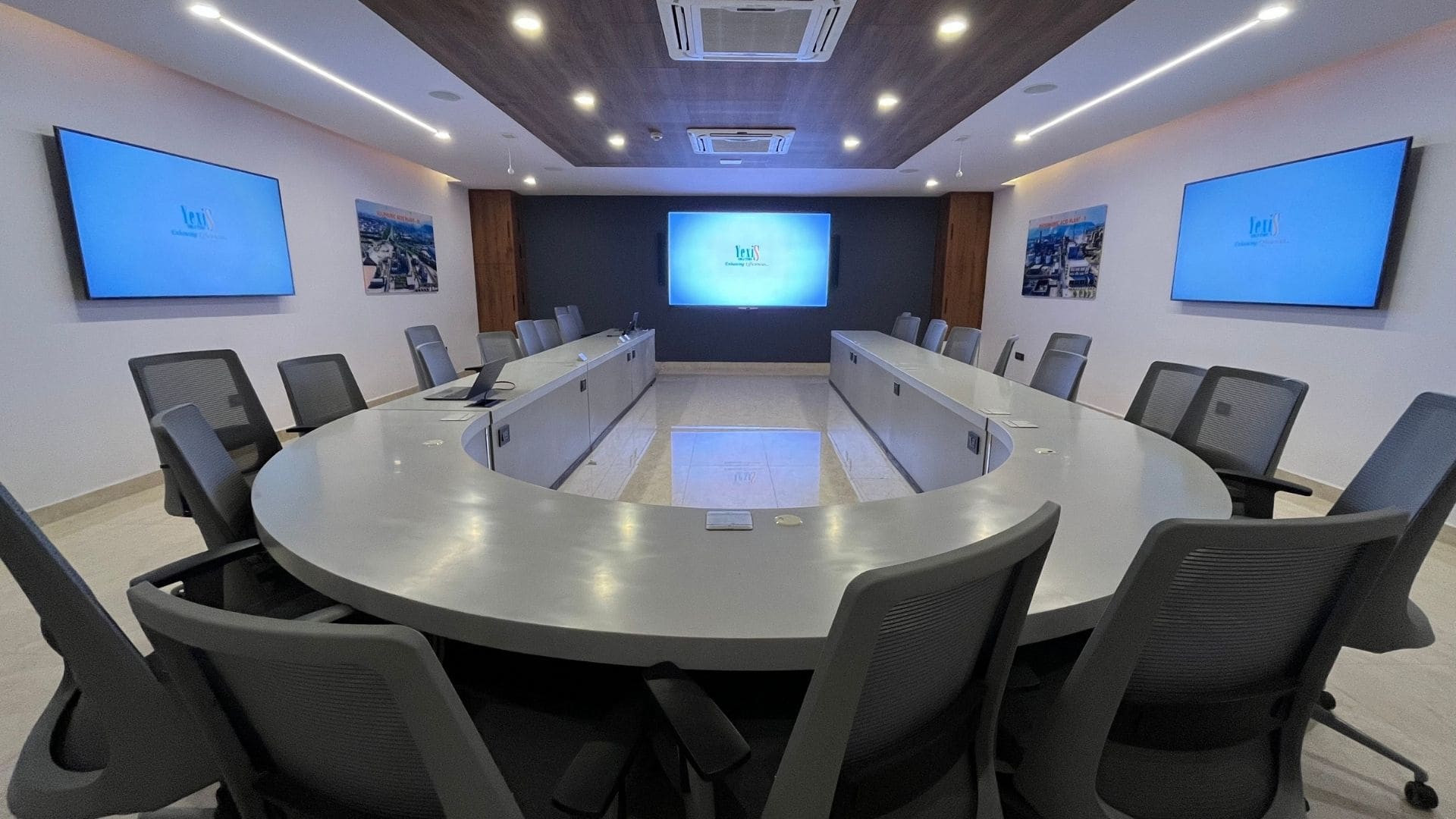 AMX control interface and JBL audio integration within the Murugappa Group conference suite.