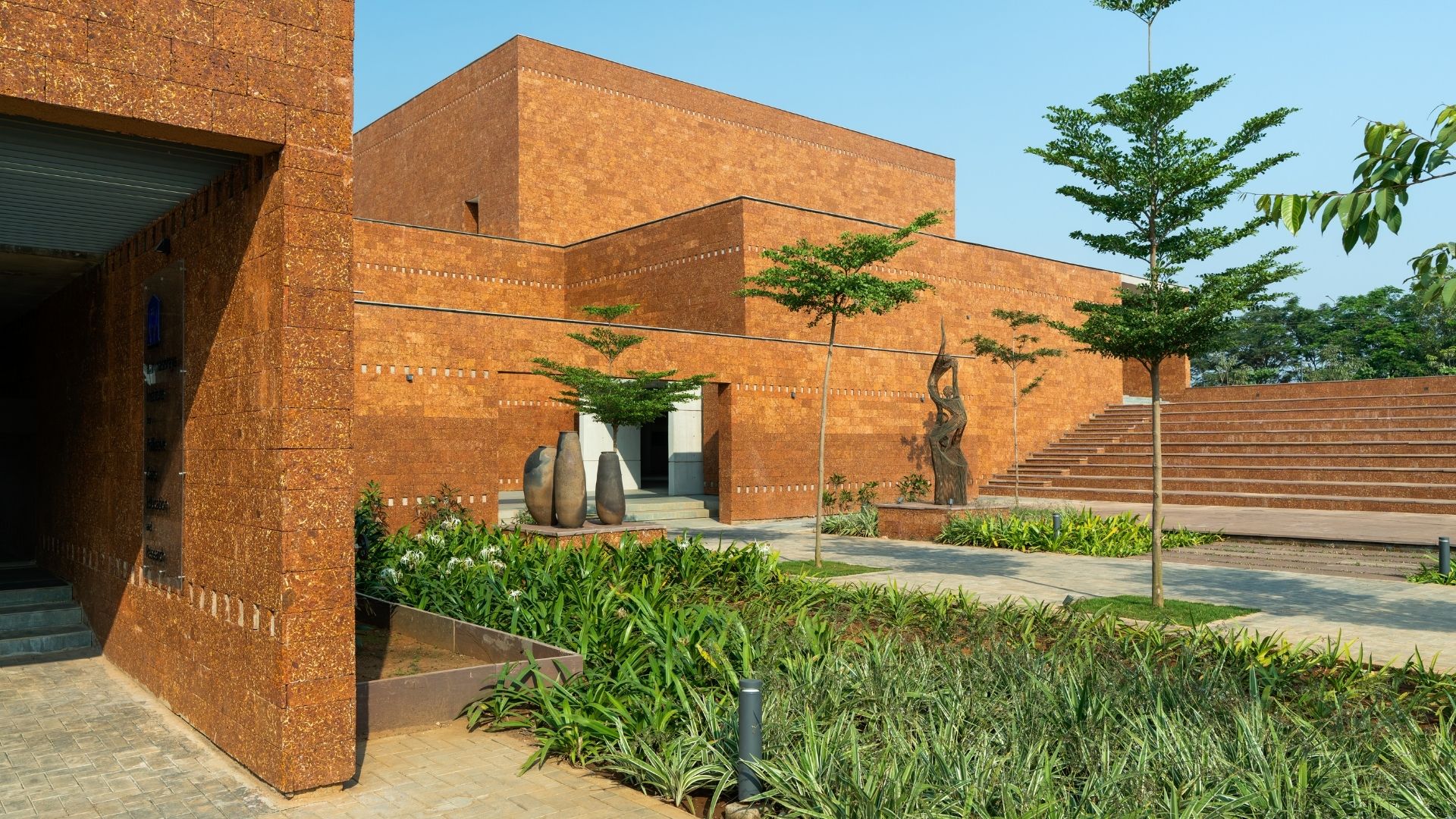 Patient care area at Bagchi Karunashraya designed for comfort and dignity with views of flowing water ponds.