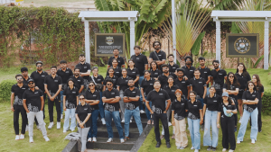 Modern corporate office interior designed by Ostraca Architects featuring collaborative workspace design and integrated audiovisual technology.