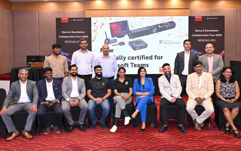 Microsoft Teams Room certification logo displayed alongside Barco and Sennheiser hardware.