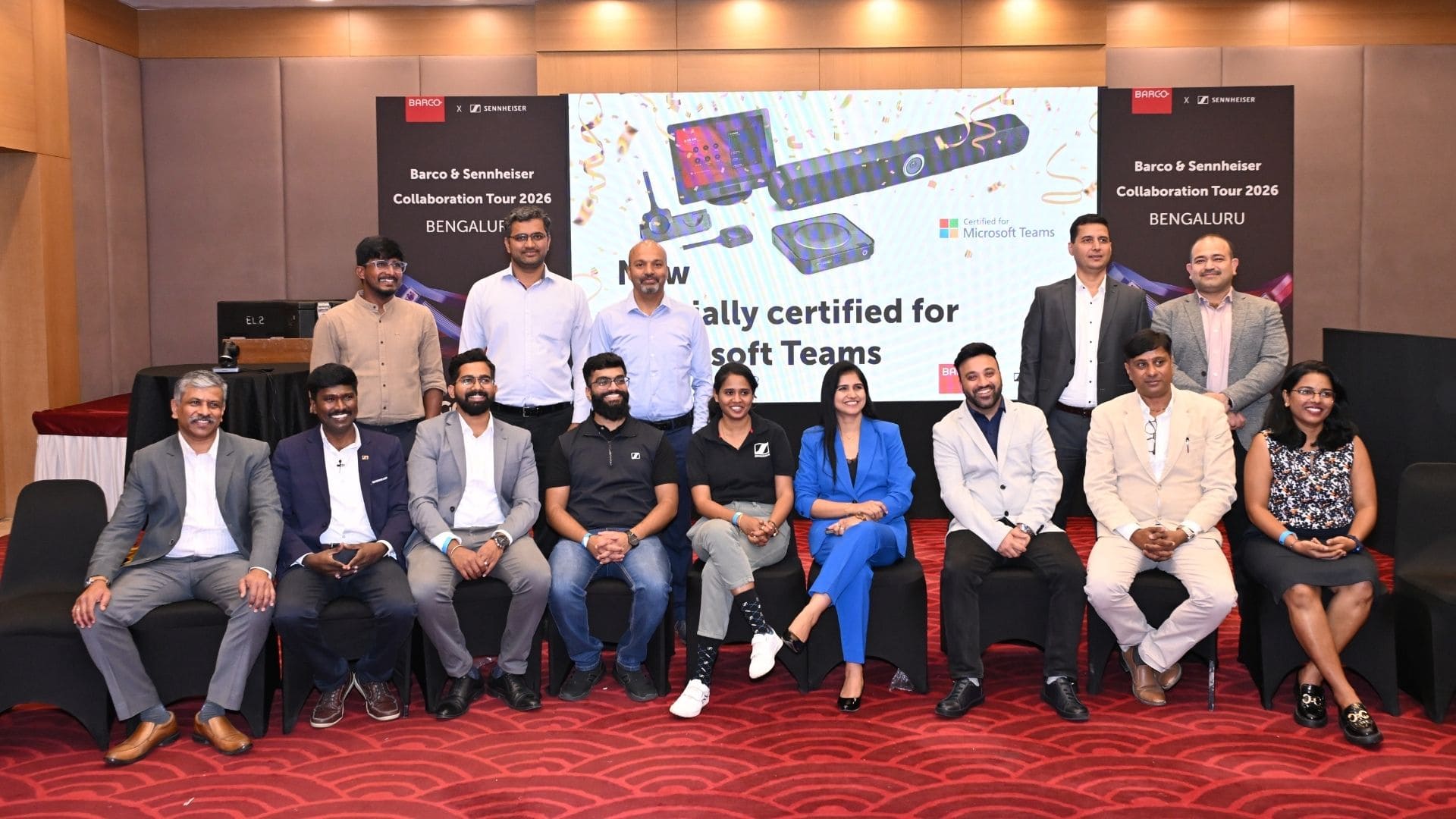 Microsoft Teams Room certification logo displayed alongside Barco and Sennheiser hardware.