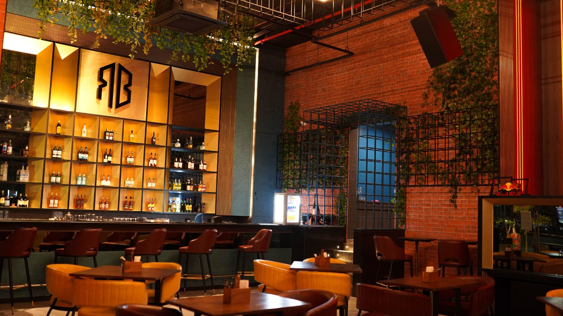 High-energy dance floor at The Revolution Bar Pune featuring d&b audiotechnik 24S loudspeakers and DJ booth.