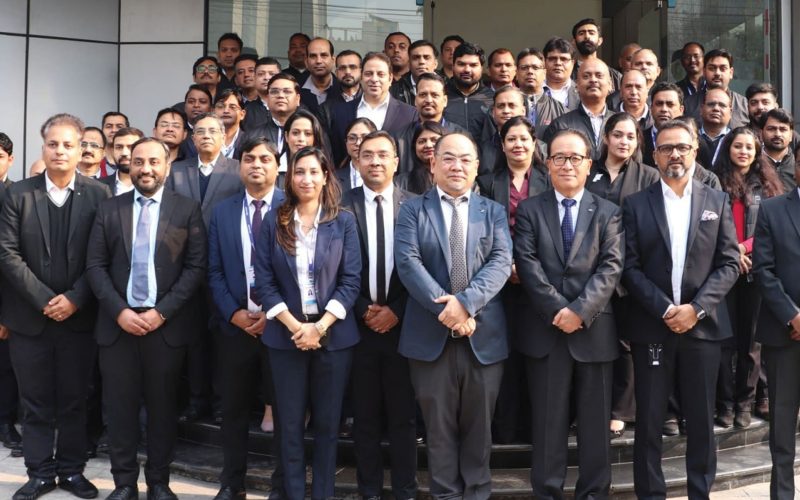 Teachers receiving hands-on technical training from Sharp India experts on how to use digital office solutions and interactive tools.