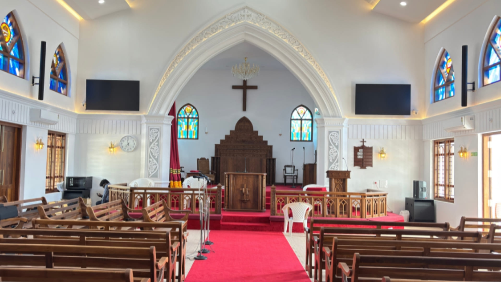 Interior of St. Paul’s Mar Thoma Church in Kozhikode featuring Tannoy VLS 30 asymmetrical vertical line source speakers for wide coverage.