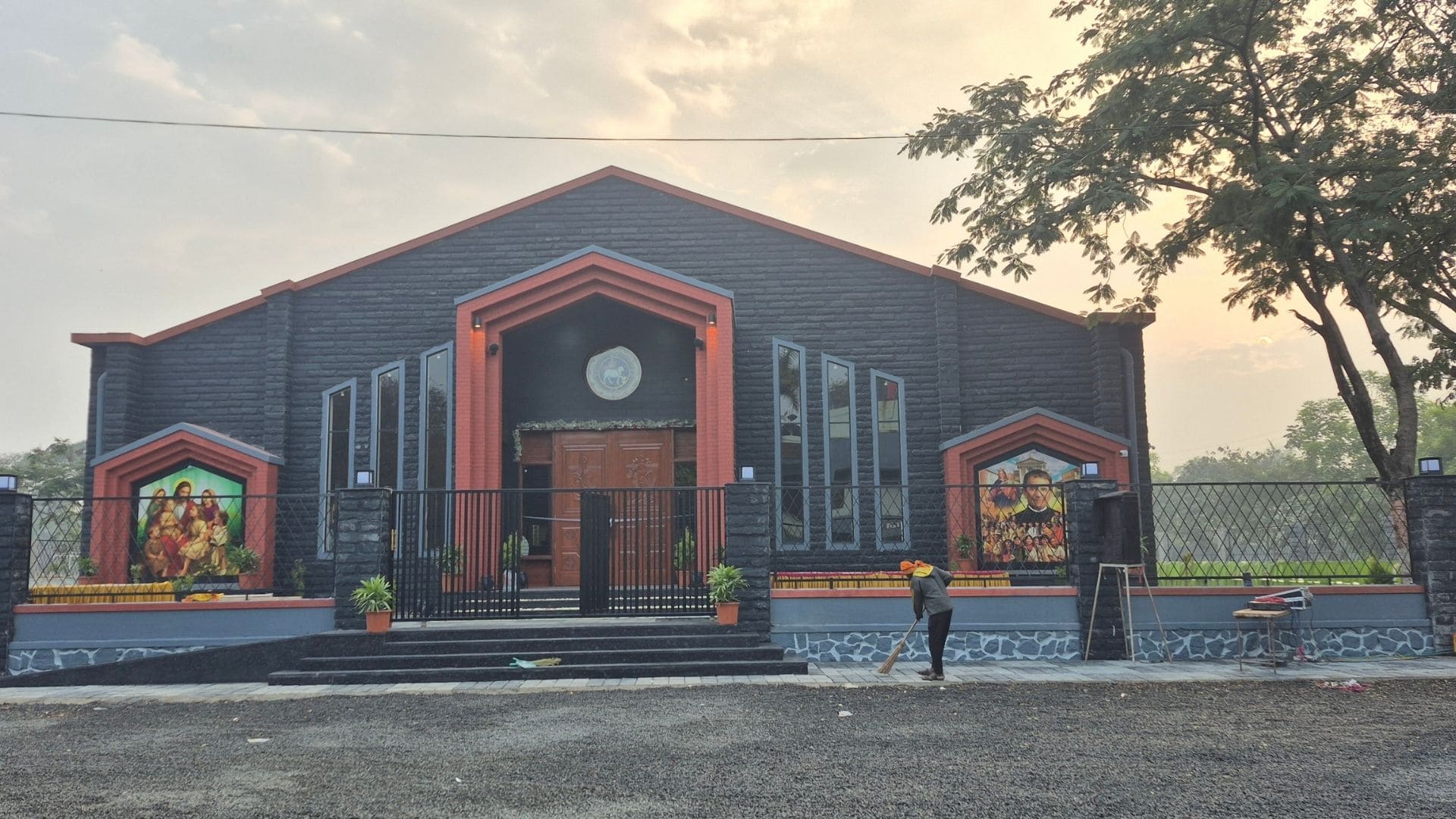 The main sanctuary of St. John Bosco Church featuring Yamaha VXL24 slim-line array speakers.