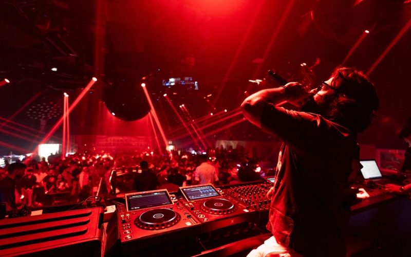 Wide shot of the main dance floor at The Leela Club, Goa, featuring the d&b audiotechnik loudspeaker system during a high-energy event.