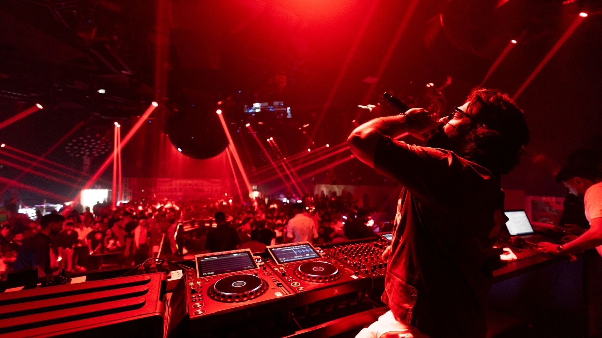 Wide shot of the main dance floor at The Leela Club, Goa, featuring the d&b audiotechnik loudspeaker system during a high-energy event.