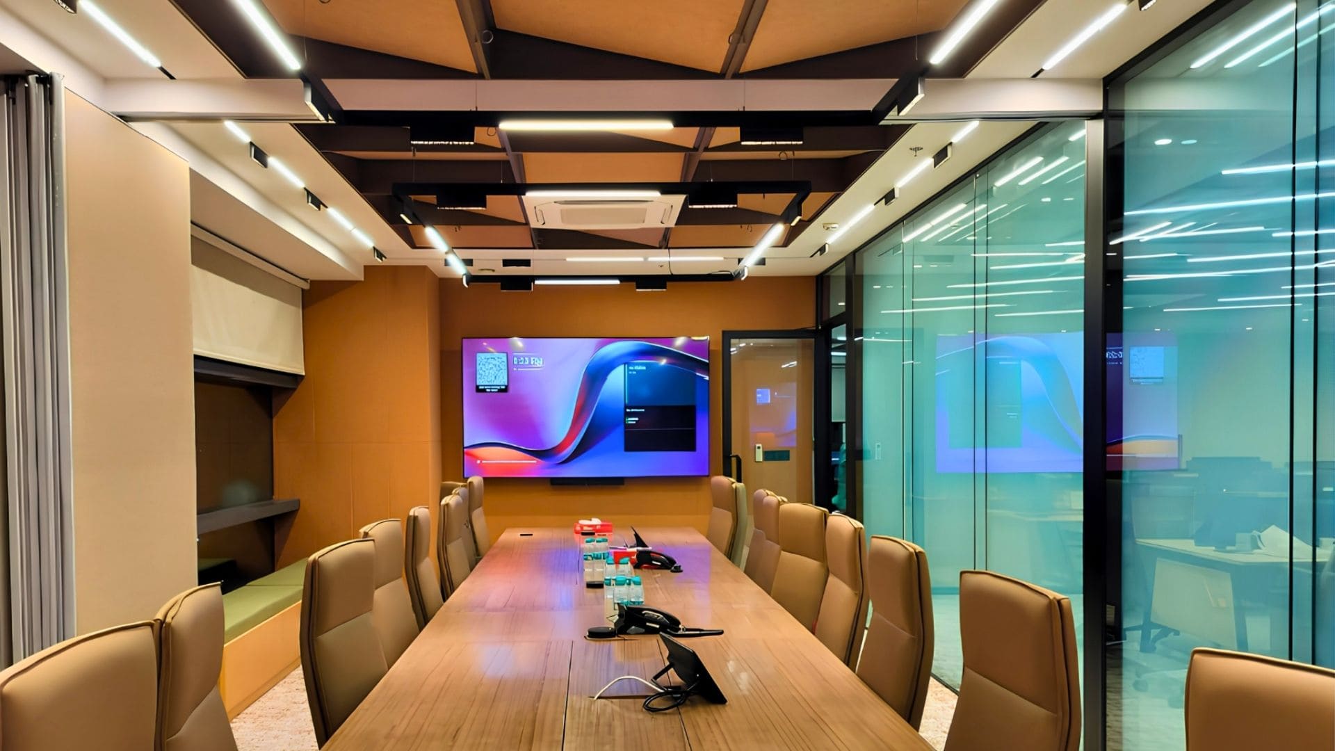 Divisible executive boardroom featuring Yealink AVHub, AI tracking cameras, and dual display collaboration.