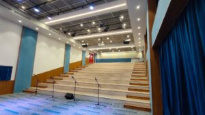 Flexible learning and performance space at Shri Ram Universal School designed for immersive educational experiences.