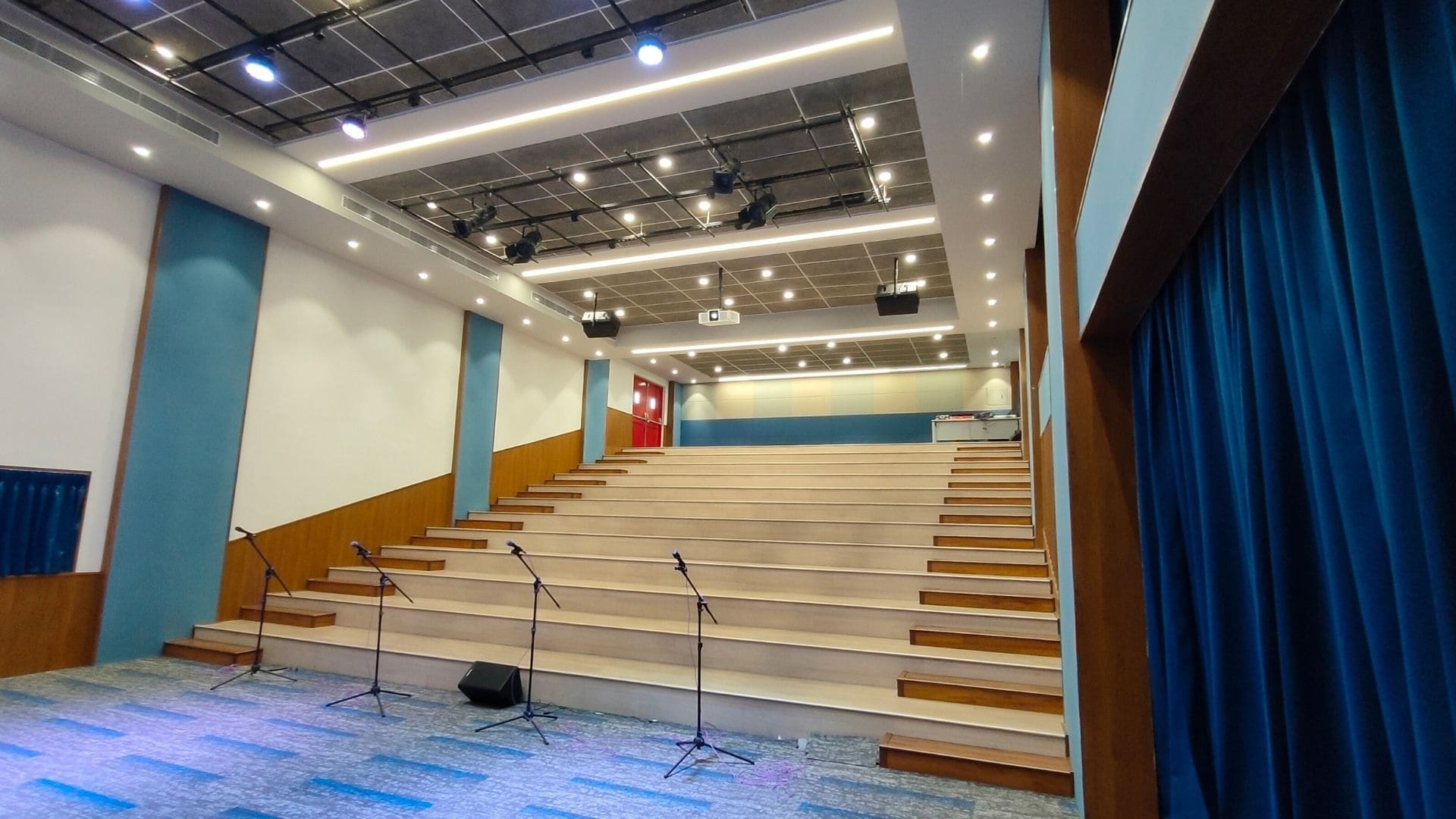 Flexible learning and performance space at Shri Ram Universal School designed for immersive educational experiences.