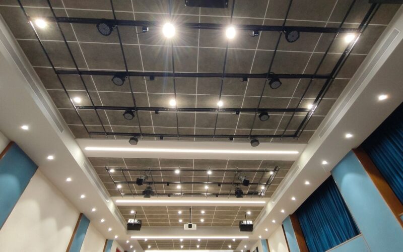 Sonodyne loudspeakers and amplification delivering uniform audio coverage in the school auditorium.