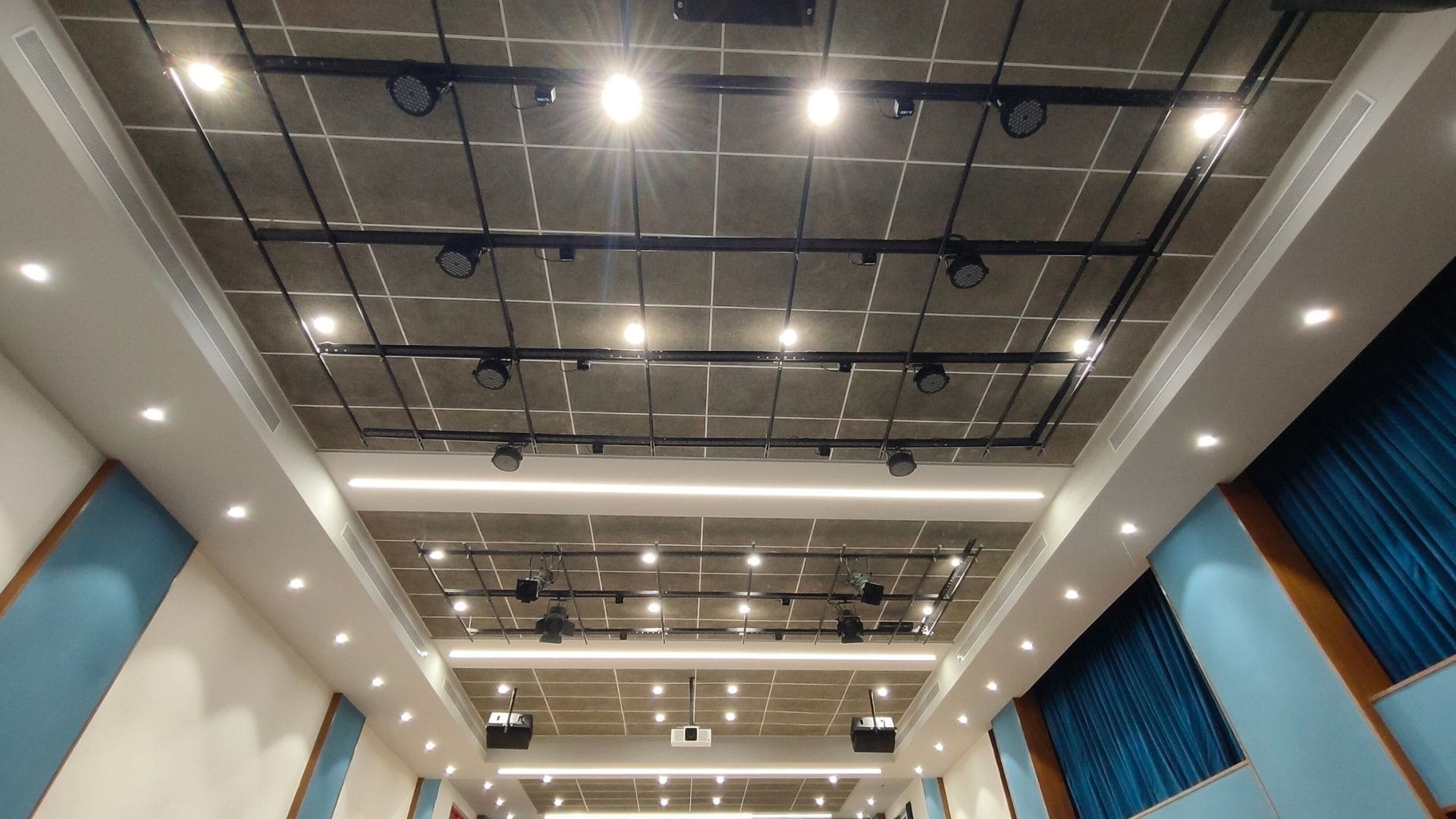Sonodyne loudspeakers and amplification delivering uniform audio coverage in the school auditorium.