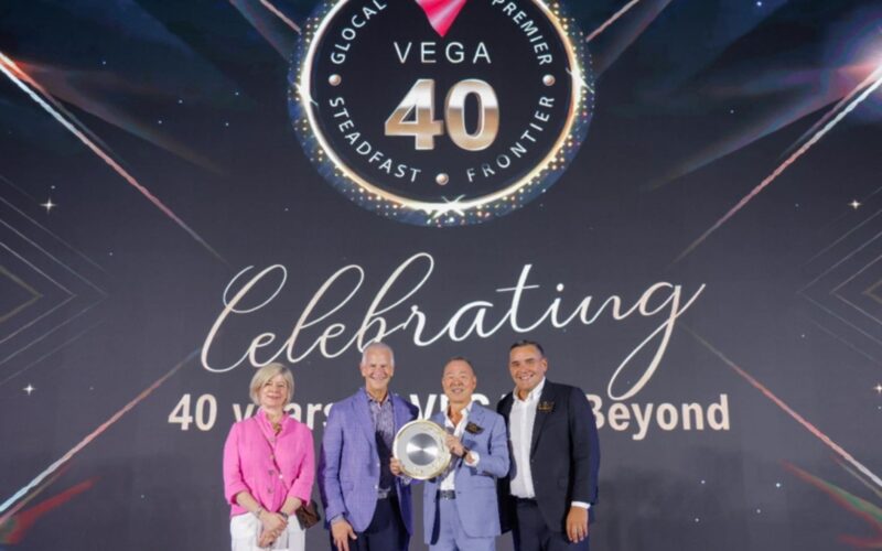 AVIXA CEO David Labuskes and Chief Global Officer Sarah Joyce presenting a commemorative gift to VEGA.