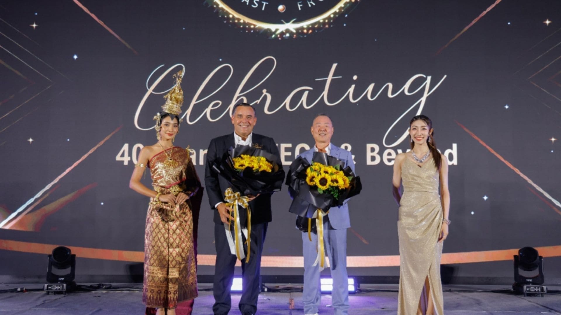 VEGA executive leadership team and regional managers participating in a celebratory toast during the 40th anniversary gala.